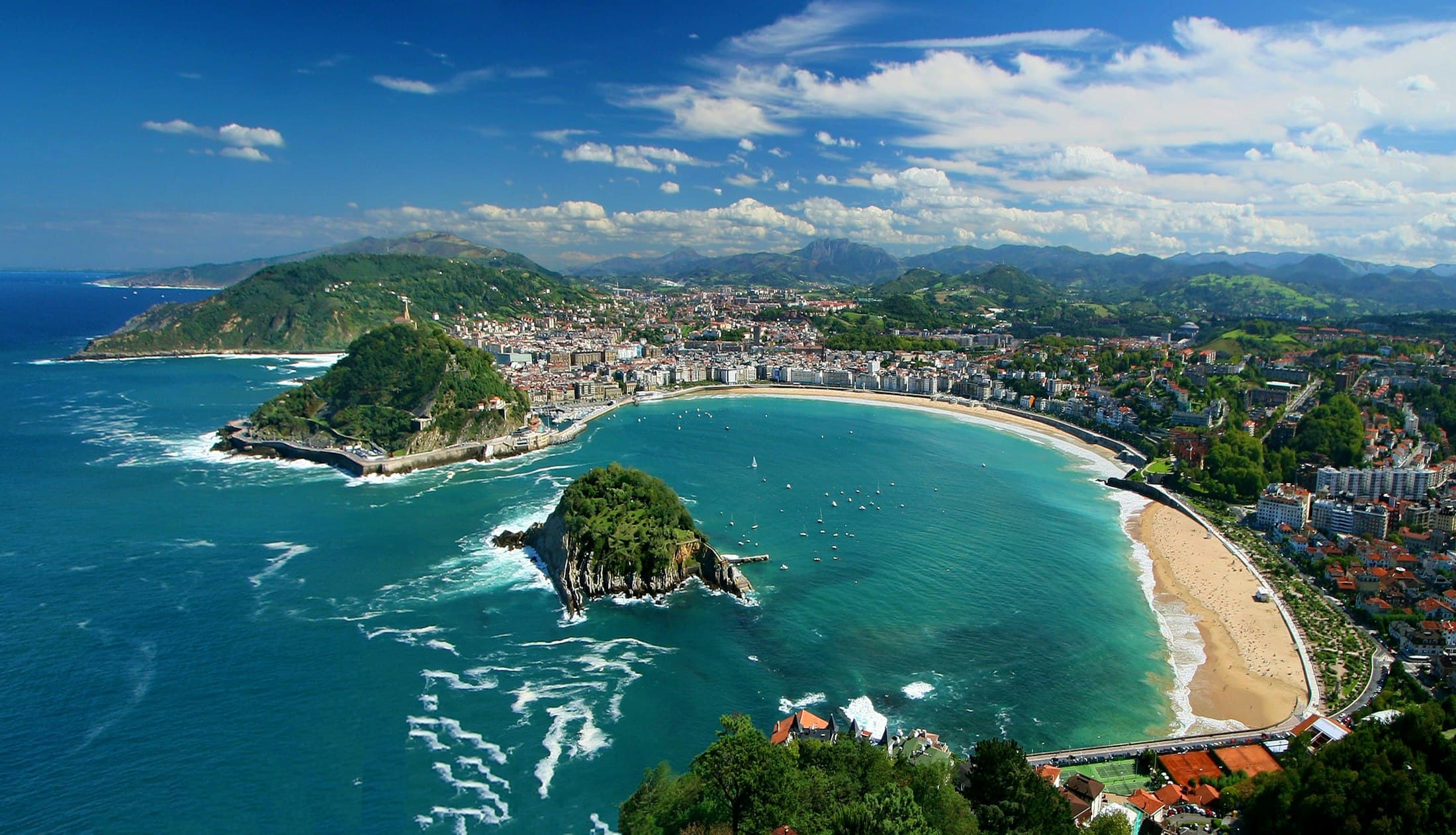 San Sebastián's shell-shaped bay and its island, seen from above
