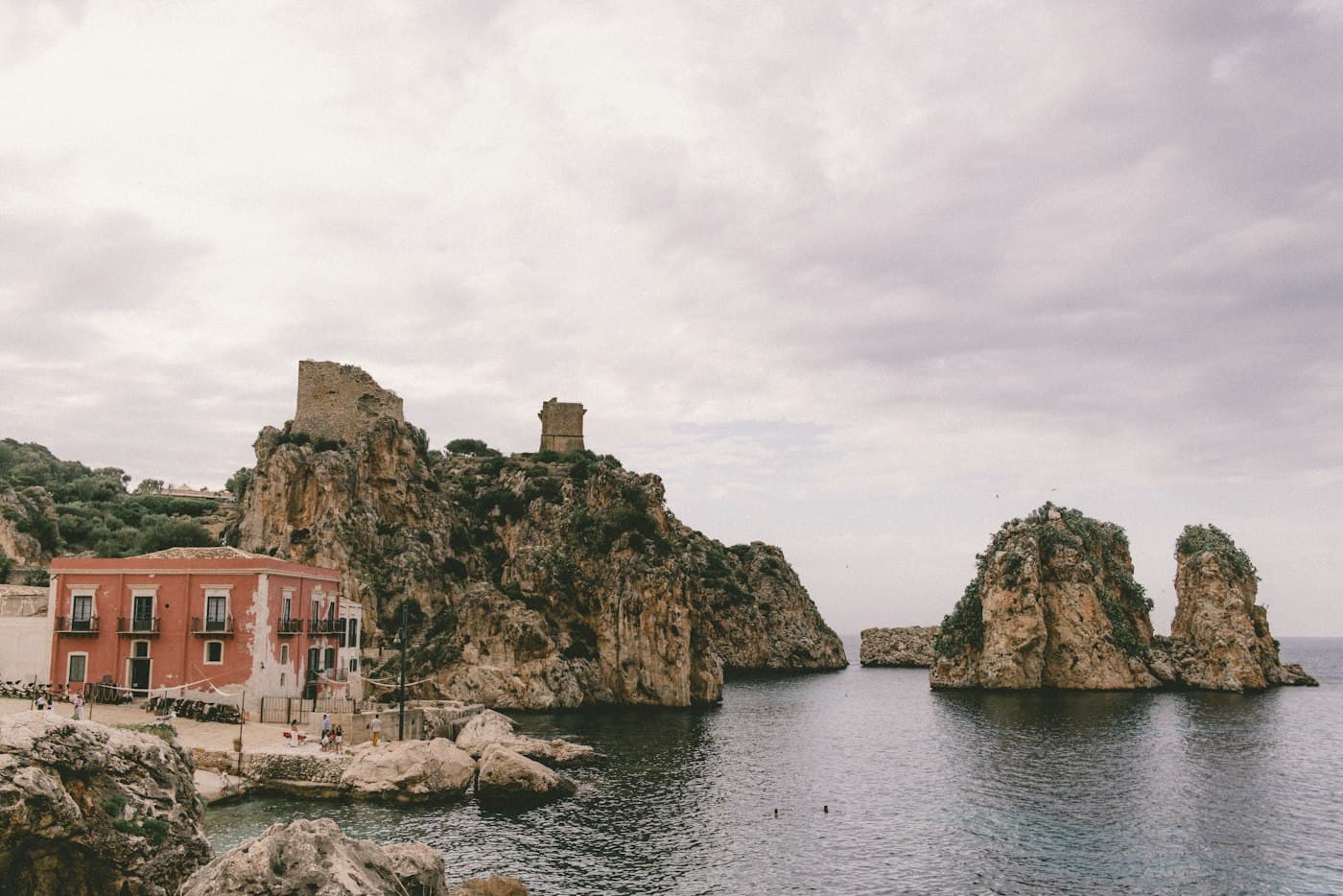 Sea stacks and an old watchtower at Scopello