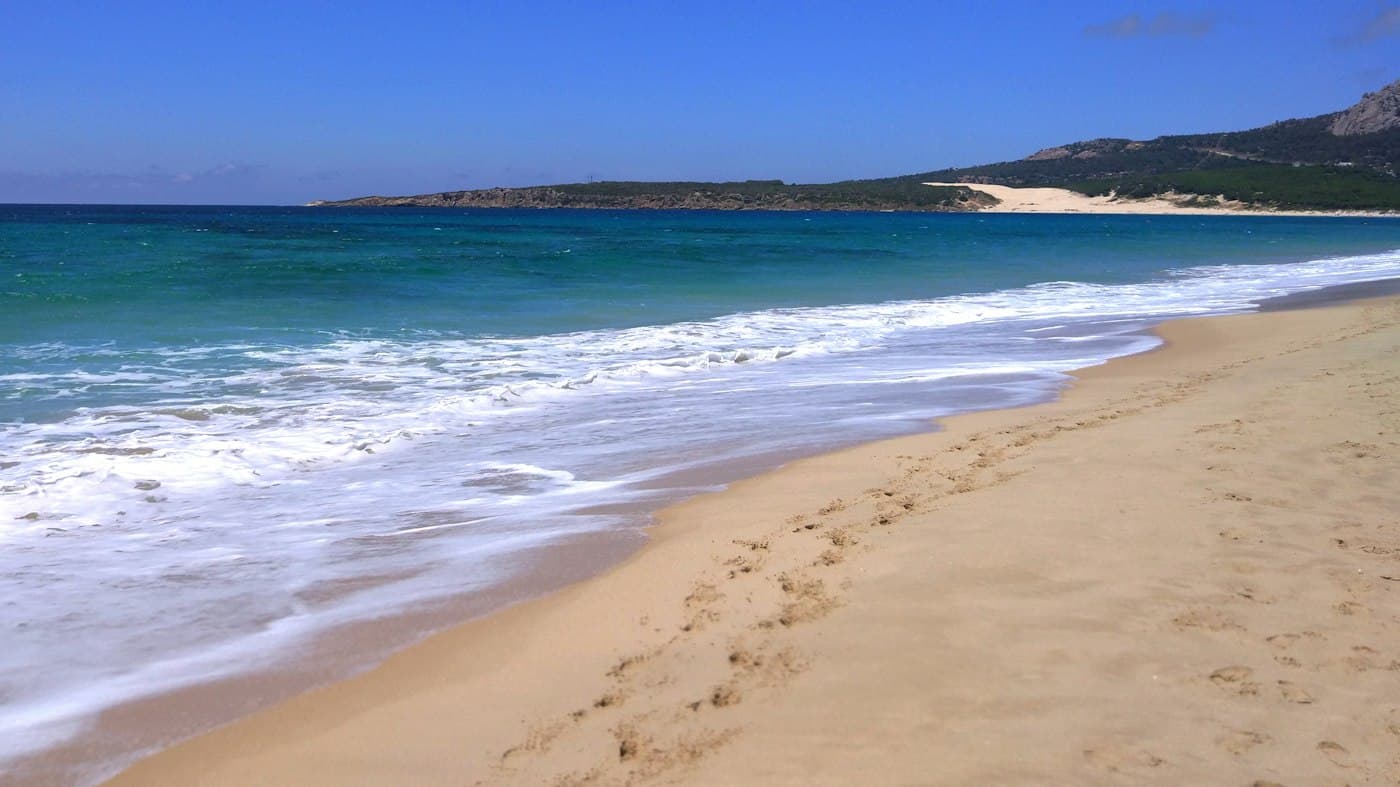 Turquoise water and a long sandy beach near Tarifa, on the Atlantic coast